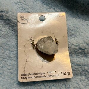 Pendant with quartz and gold